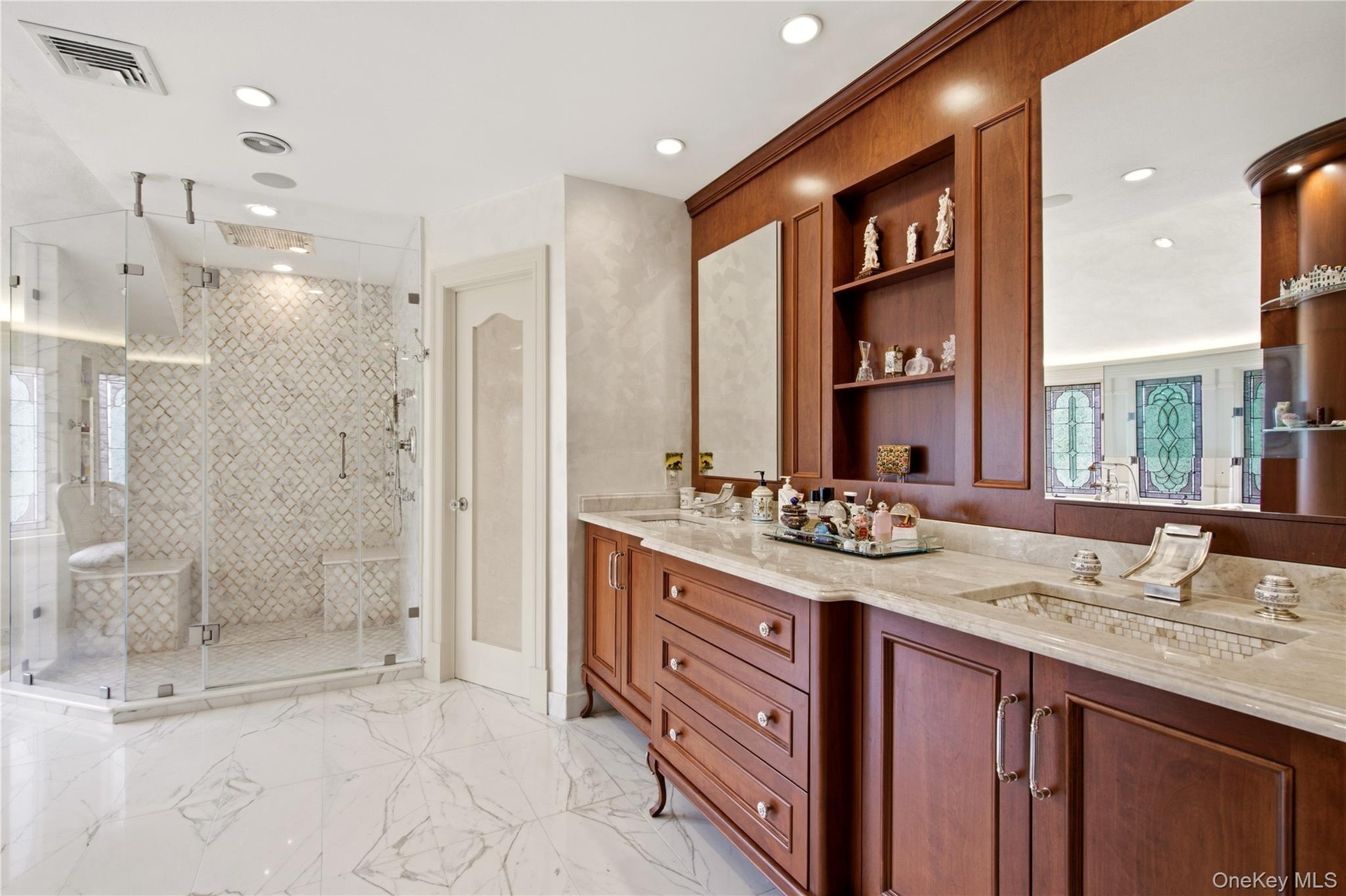 Features radiant-heated marble floors, complemented by a marble shower