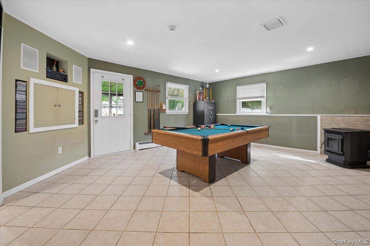 Large family room with access to your outside deck and fabulous backyard.