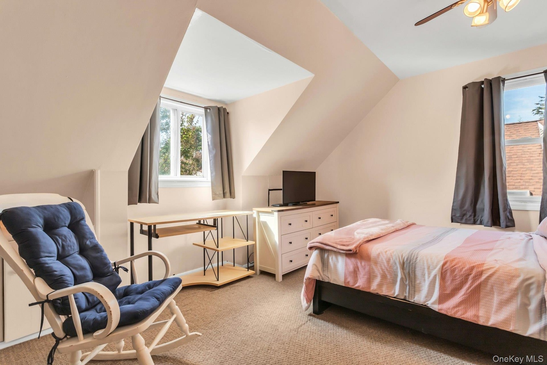 Angled ceiling lines and a neutral color palette