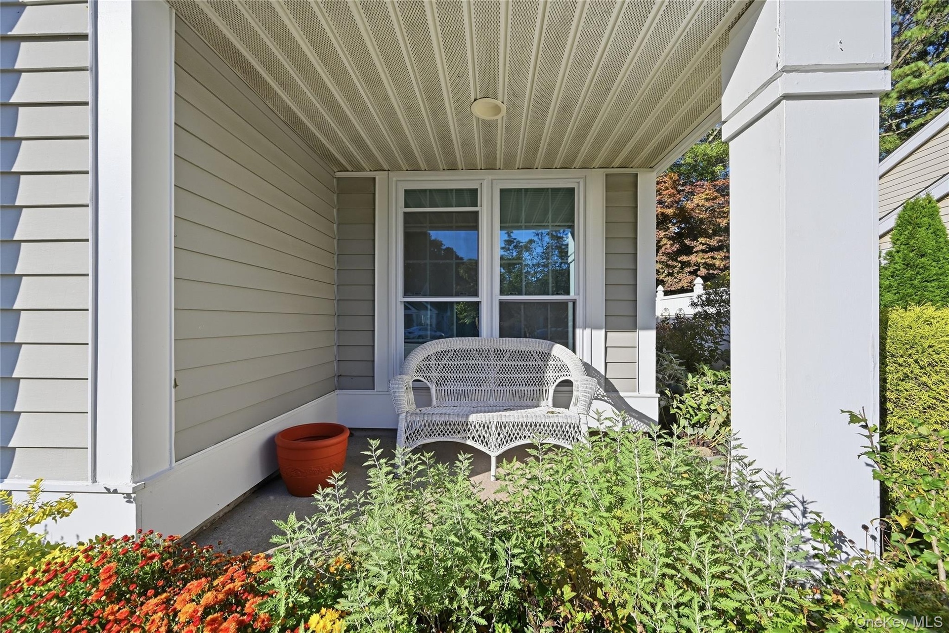 The Front Of The Condo Offers A Covered Brick/Paver Patio - A Perfect Spot To Relax & Unwind, Read The Newspaper Or Catch Up With Friends & Neighbors.