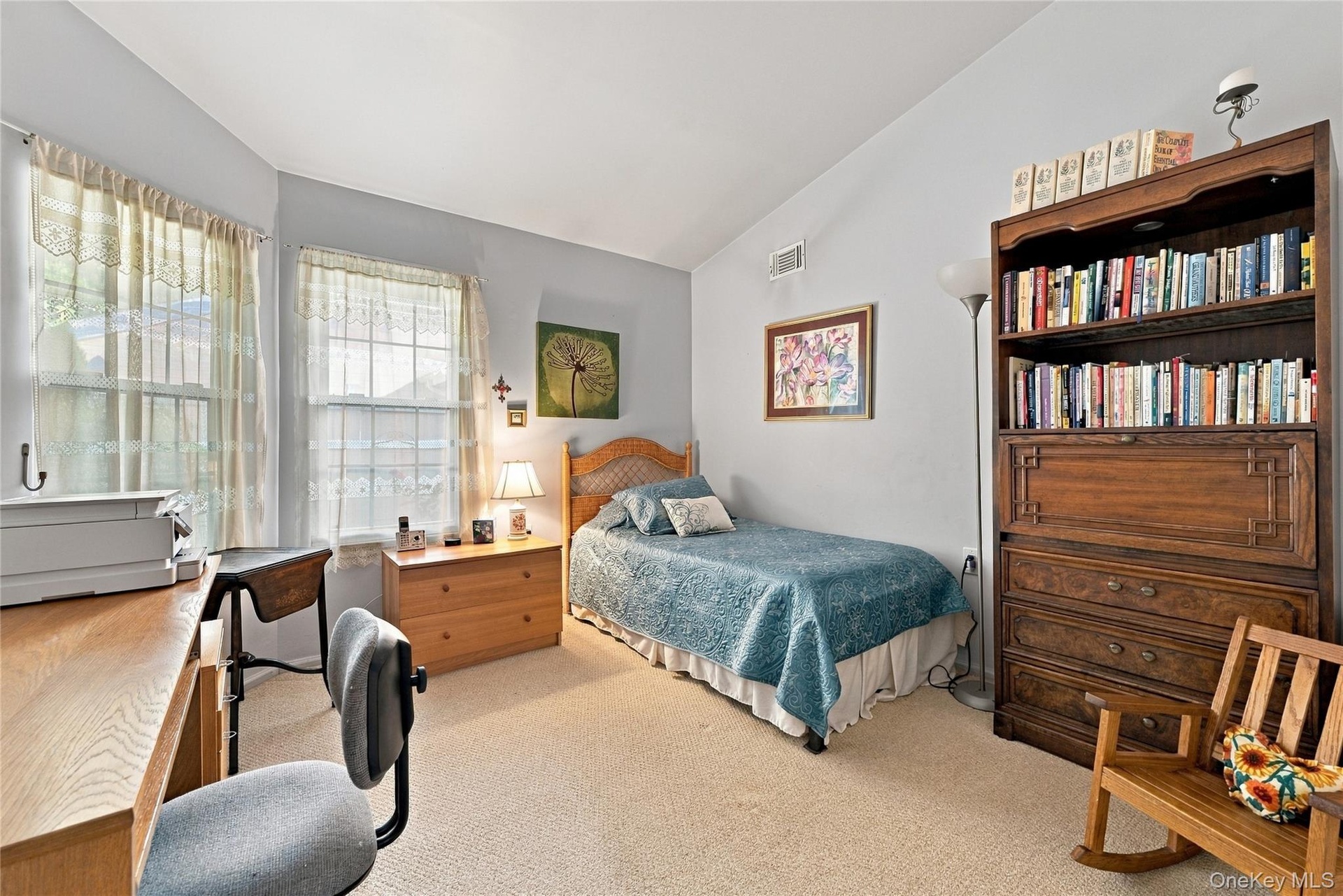 The Well Sized Guest Bedroom Offers Beautiful Vaulted/Volume Ceilings, Large Corner Tri State Windows For Natural Light, A Triple Closet & Ample Room 