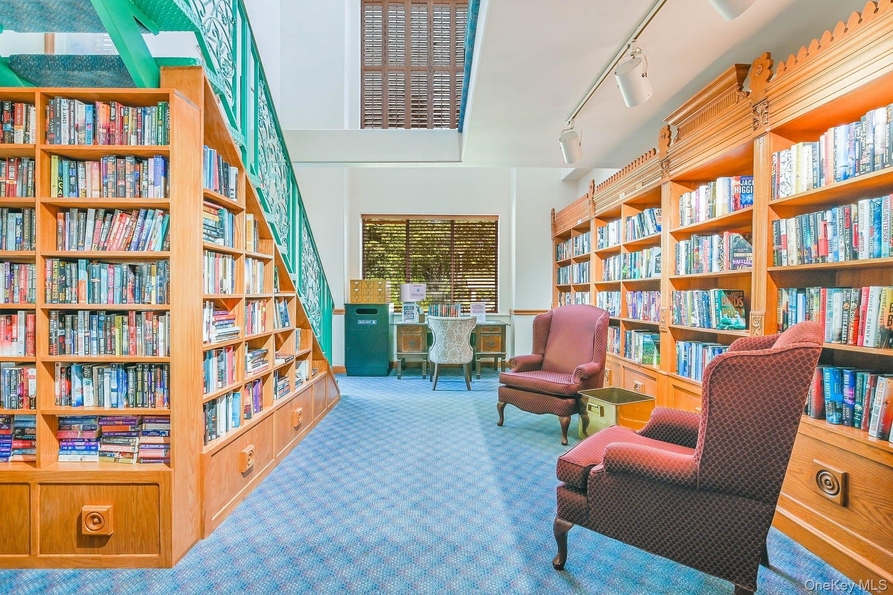 The Two Story Library In The Leisure Glen Country Club Clubhouse