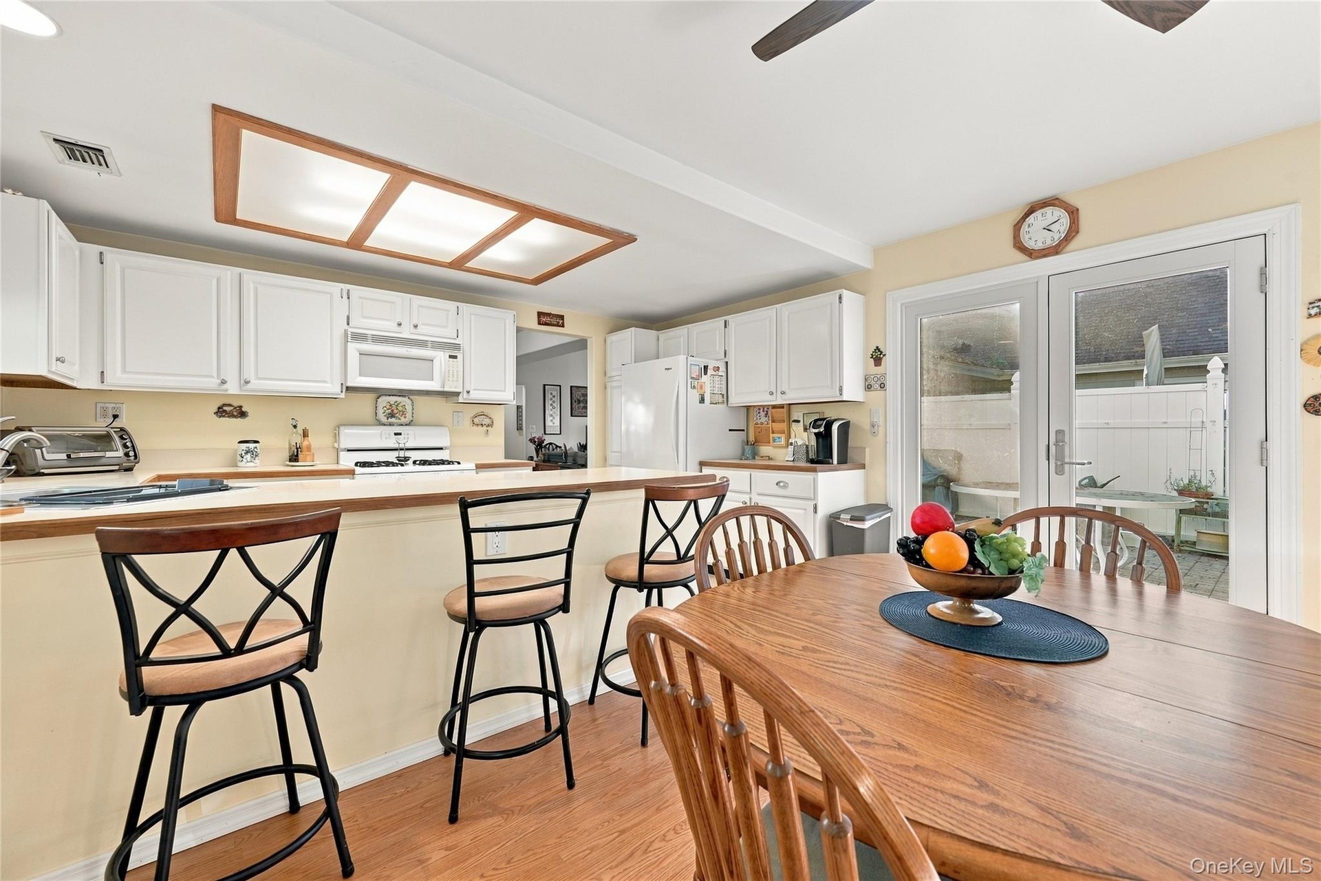 The Kitchen/Leisure Room Also Offers  New Andersen French Doors To A Large Brick/Paver Patio & The Private Backyard, And New Andersen Windows For Natu