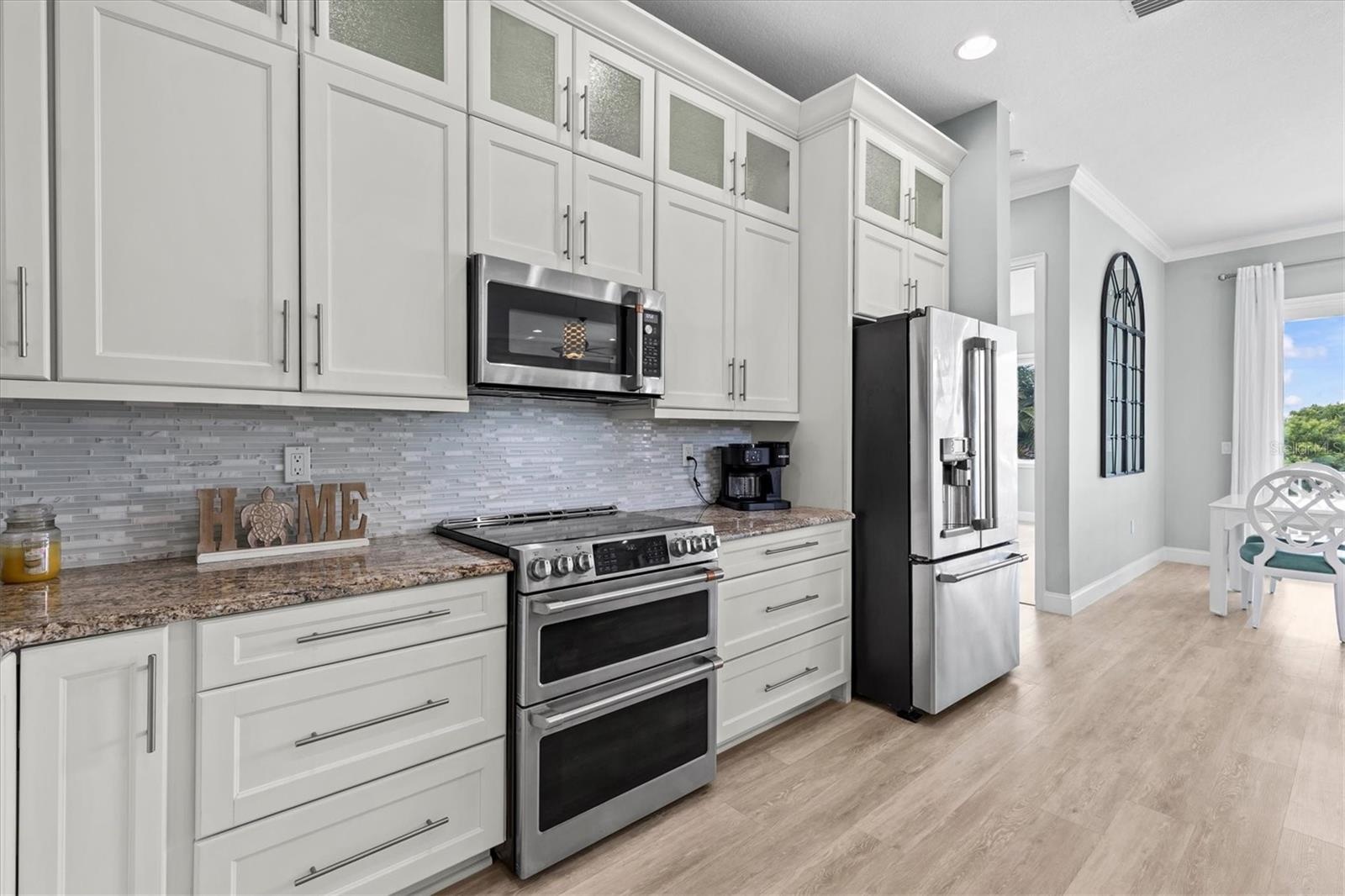 White Shaker Cabinets top Cabinets with Glass Doors