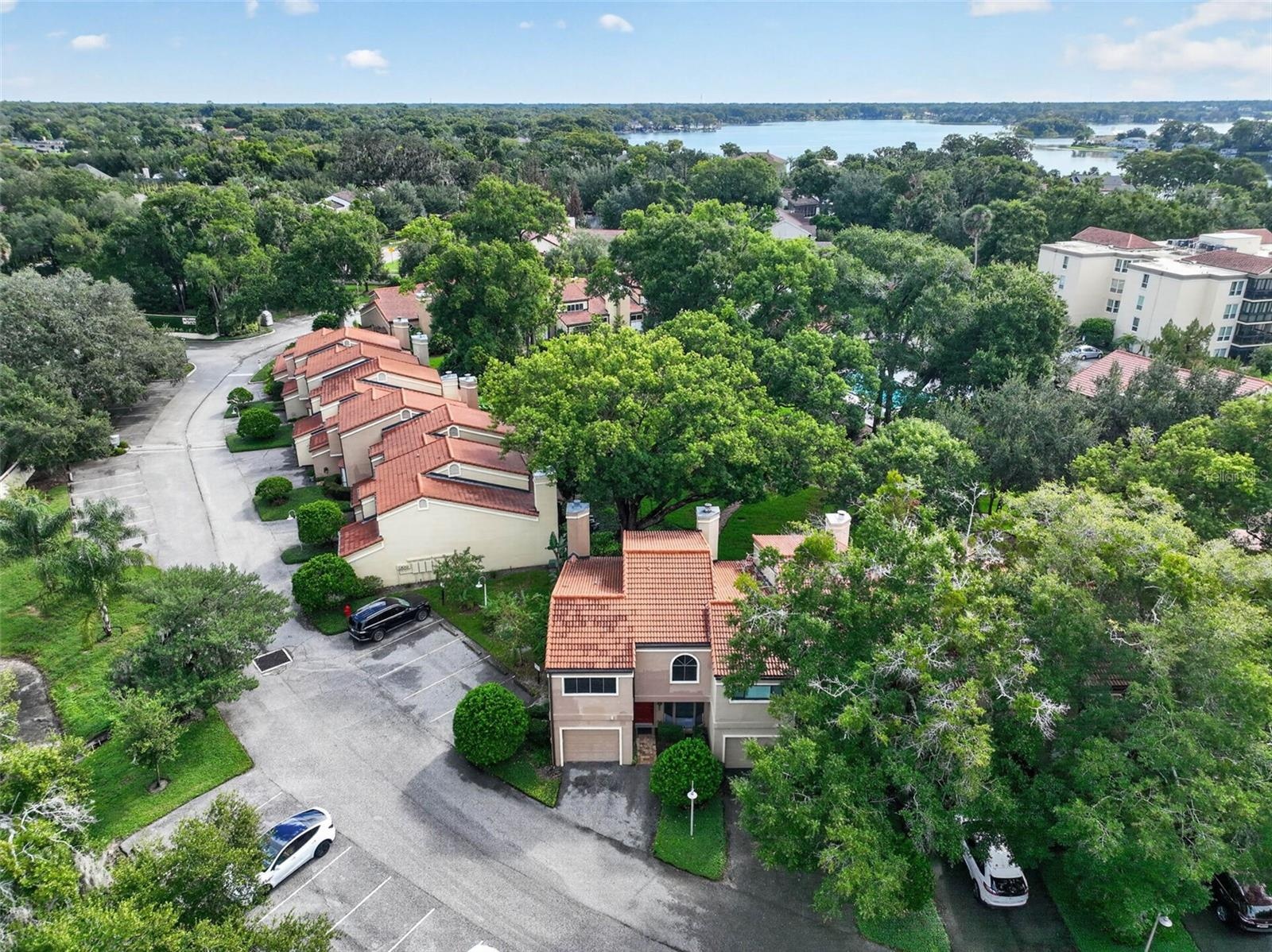 AERIAL VIEW OF TOWNHOME, THE COMMUNITY + LAKE MAITLAND