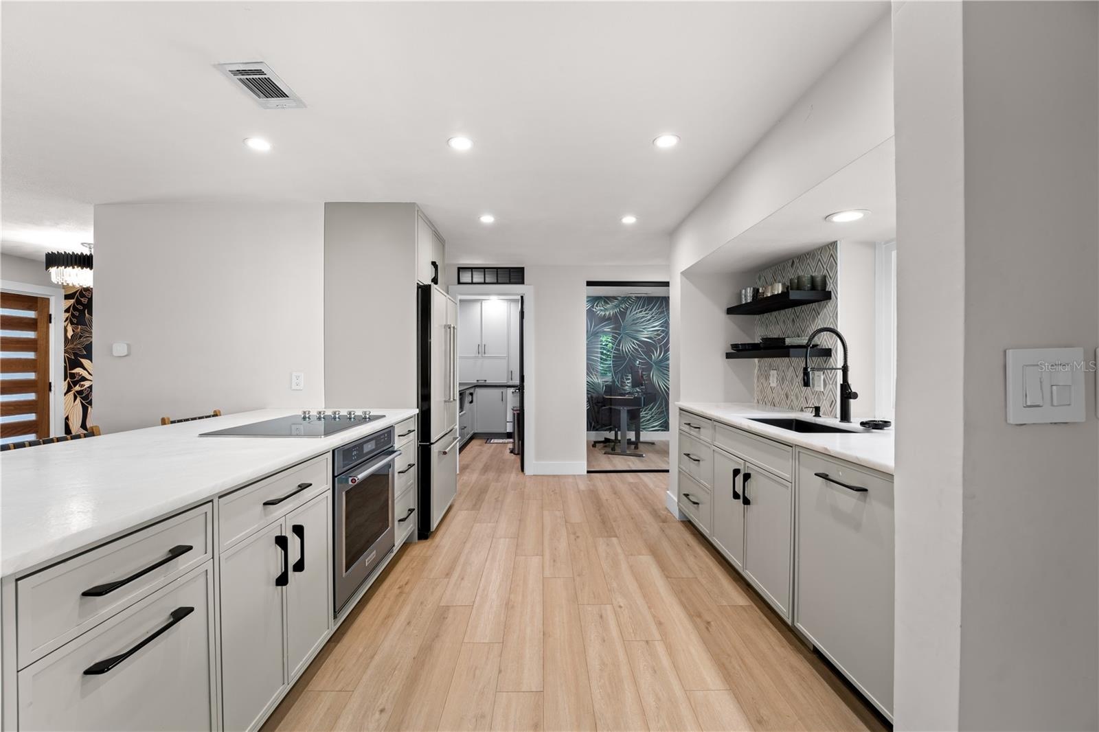 Kitchen View Towards Walk-In Pantry