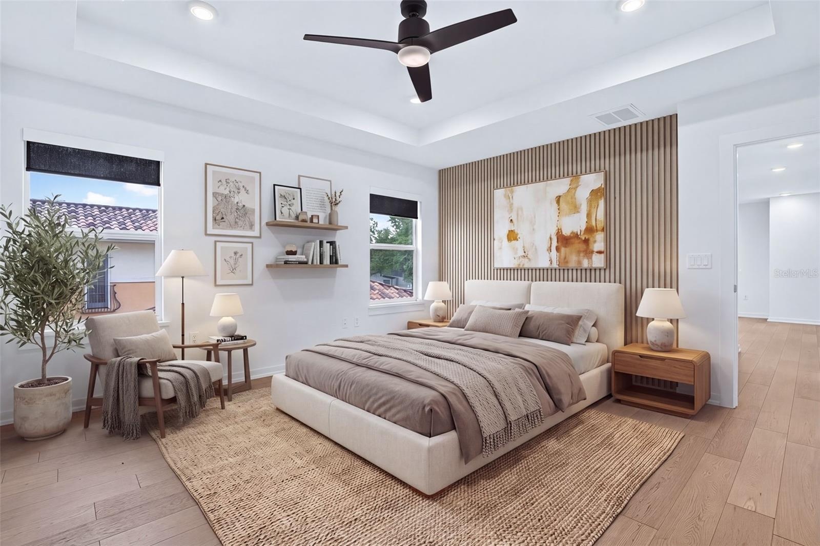 Master Suite-Hardwood Flooring- Tray Ceilings-Bright lighting with window  shades.