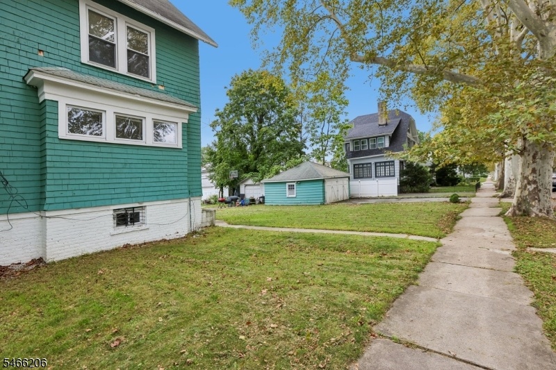Side of Home & 2 Car Garage