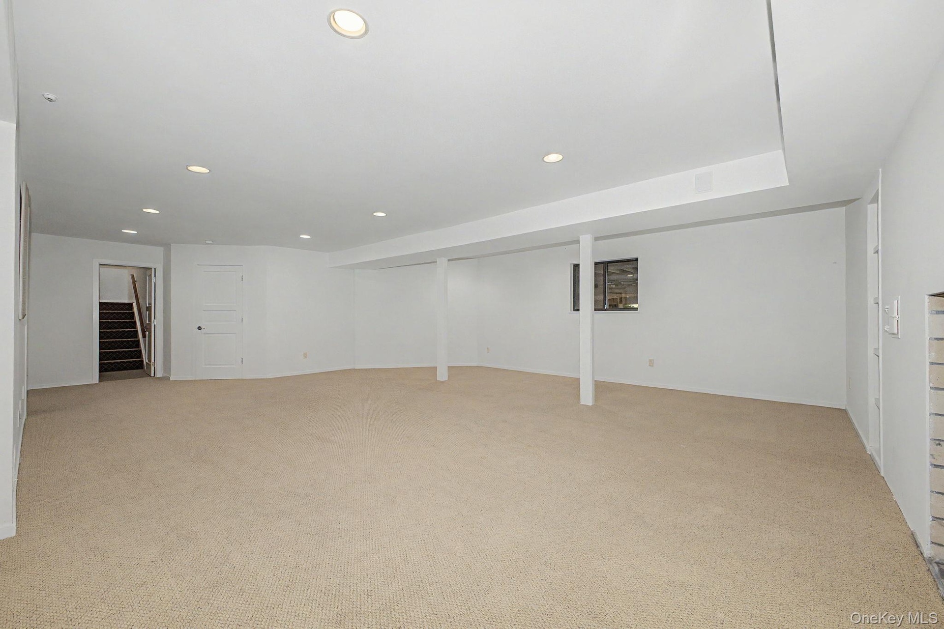 Finished lower level with ample space for recreation and relaxation.