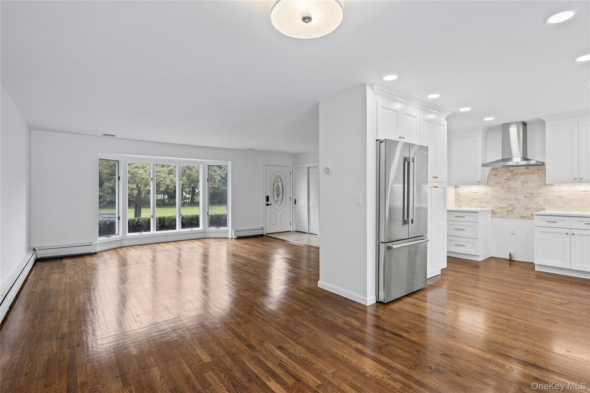 View from Dining Room into Living Room- Lovely open floor plan for living and entertaining.