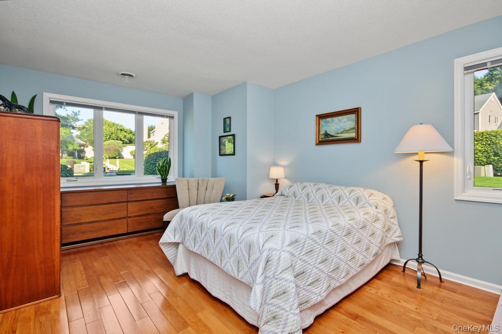 Primary Bedroom on first floor has hardwood floors