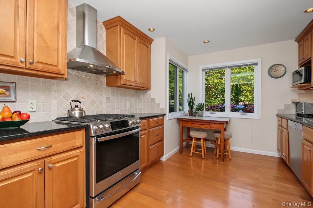 Updated Kitchen featuring hardwood floors