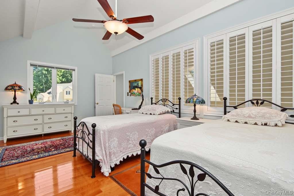 Second floor Primary Bedroom has ceiling fan with light