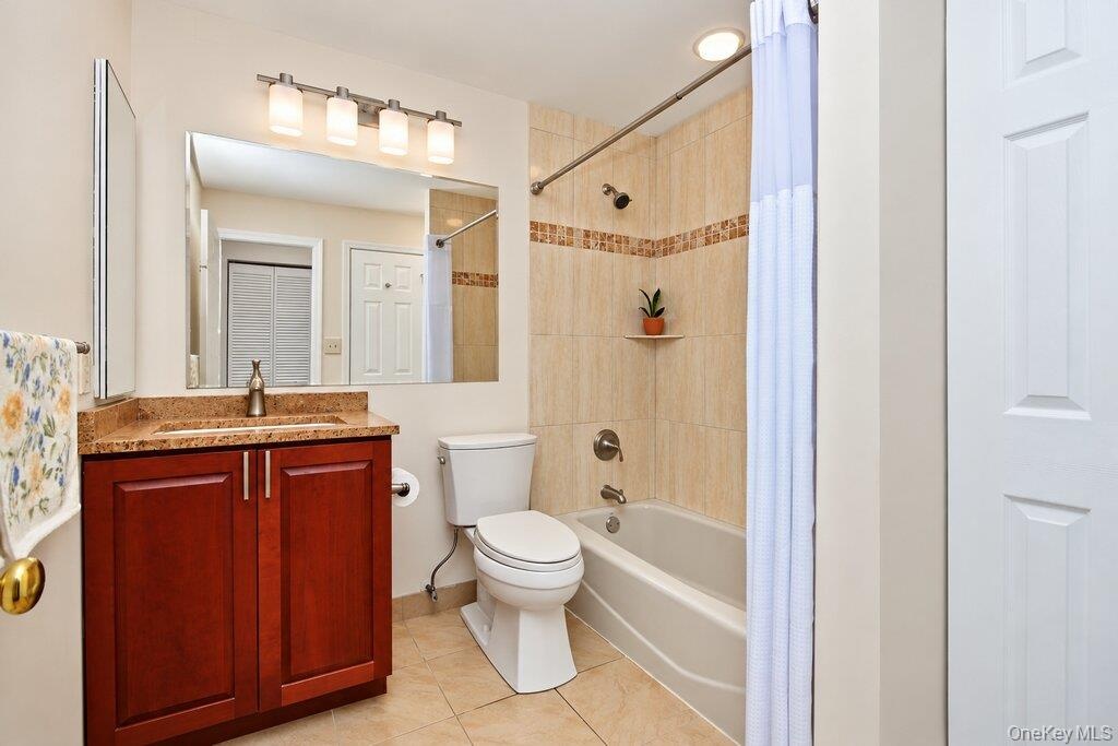 First floor Primary Bathroom has a sink with vanity and bathtub with shower combo