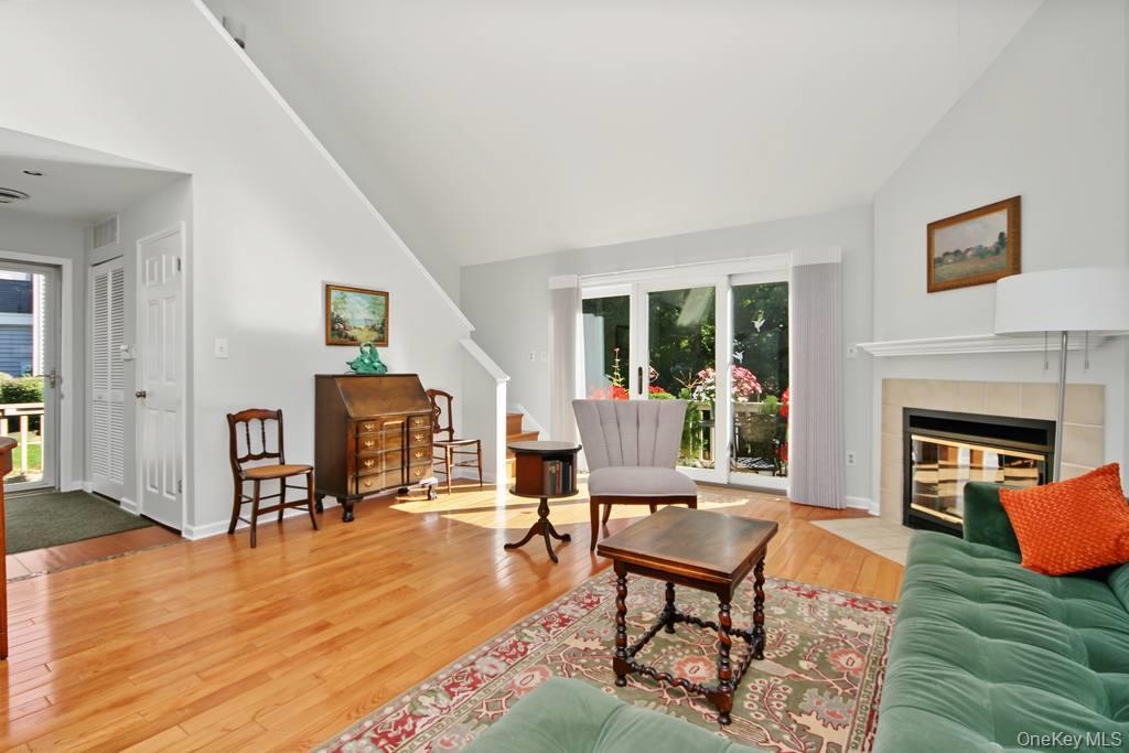 Living room has cathedral ceiling