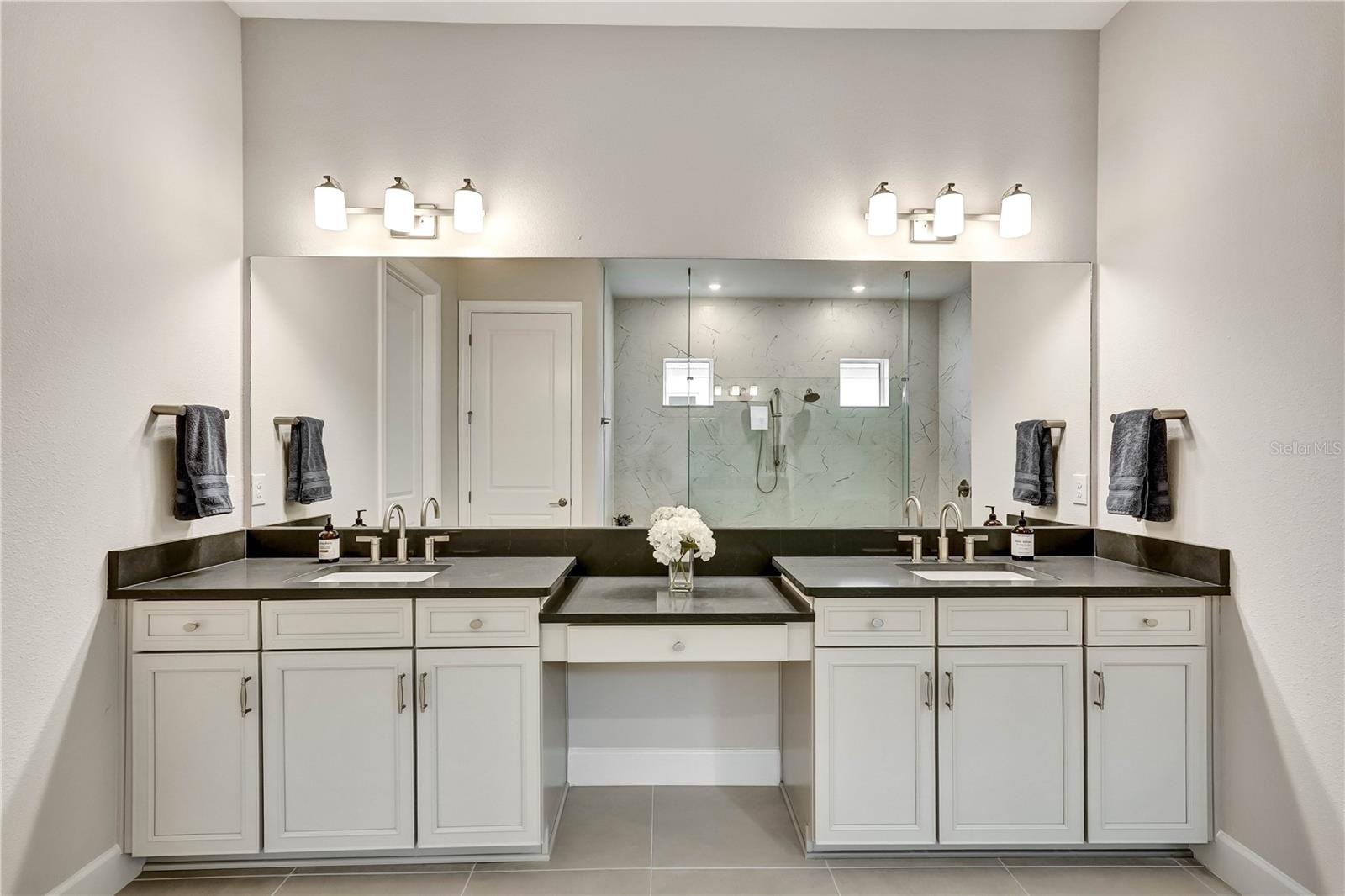 master bath dual vanities with makeup area