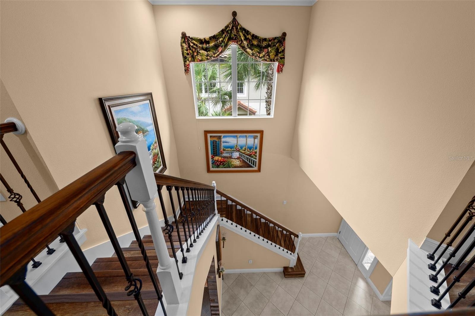 High ceilings and natural light create an open, airy feel between floors.
