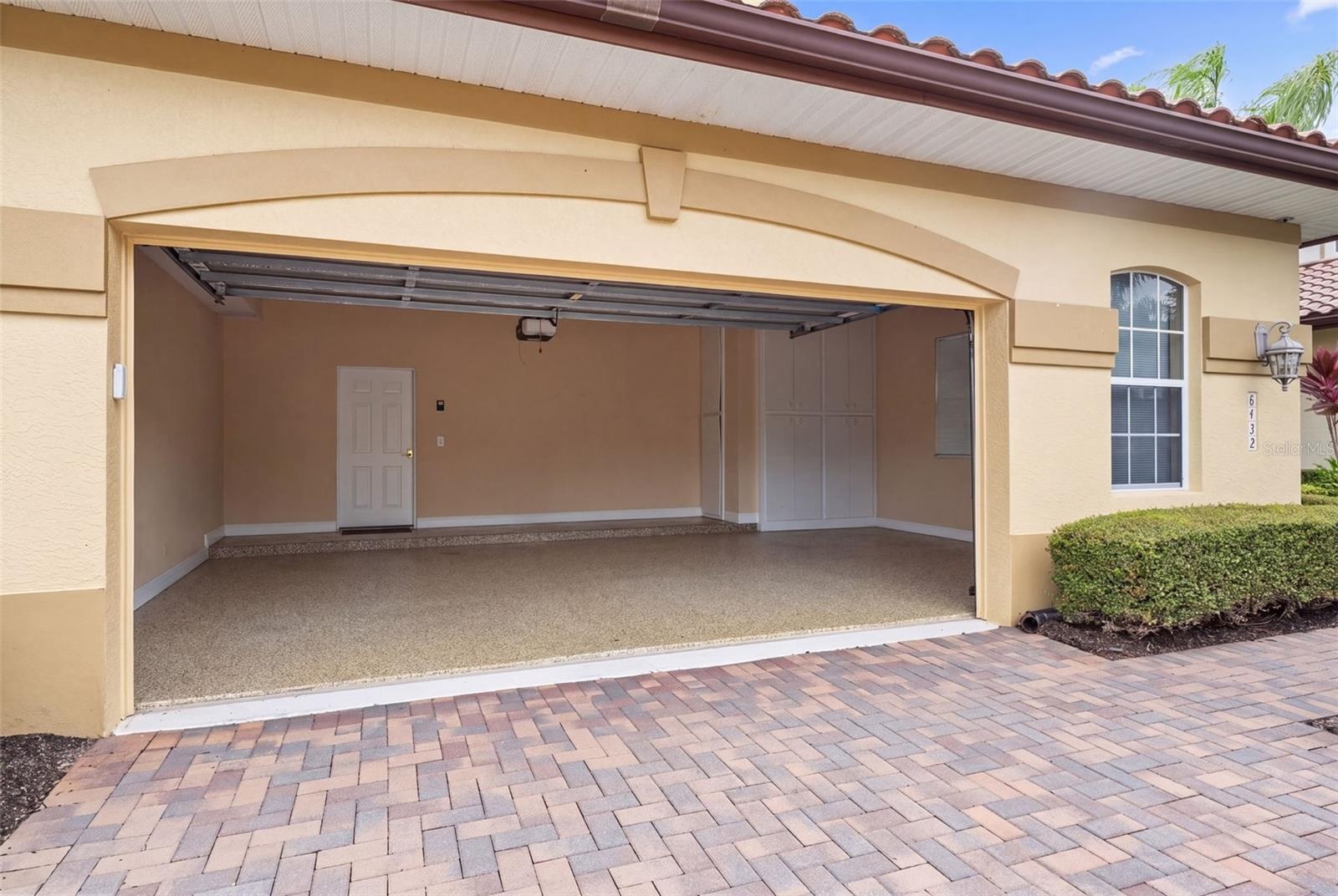 A spacious 28-by-22-foot garage offers room for two cars, a golf cart, and your Florida adventure gear.