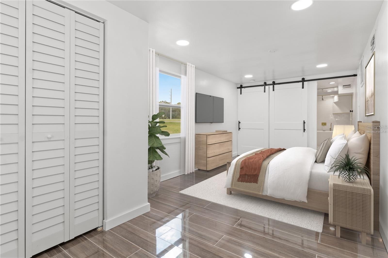 Second primary bedroom, bottom floor, virtually staged