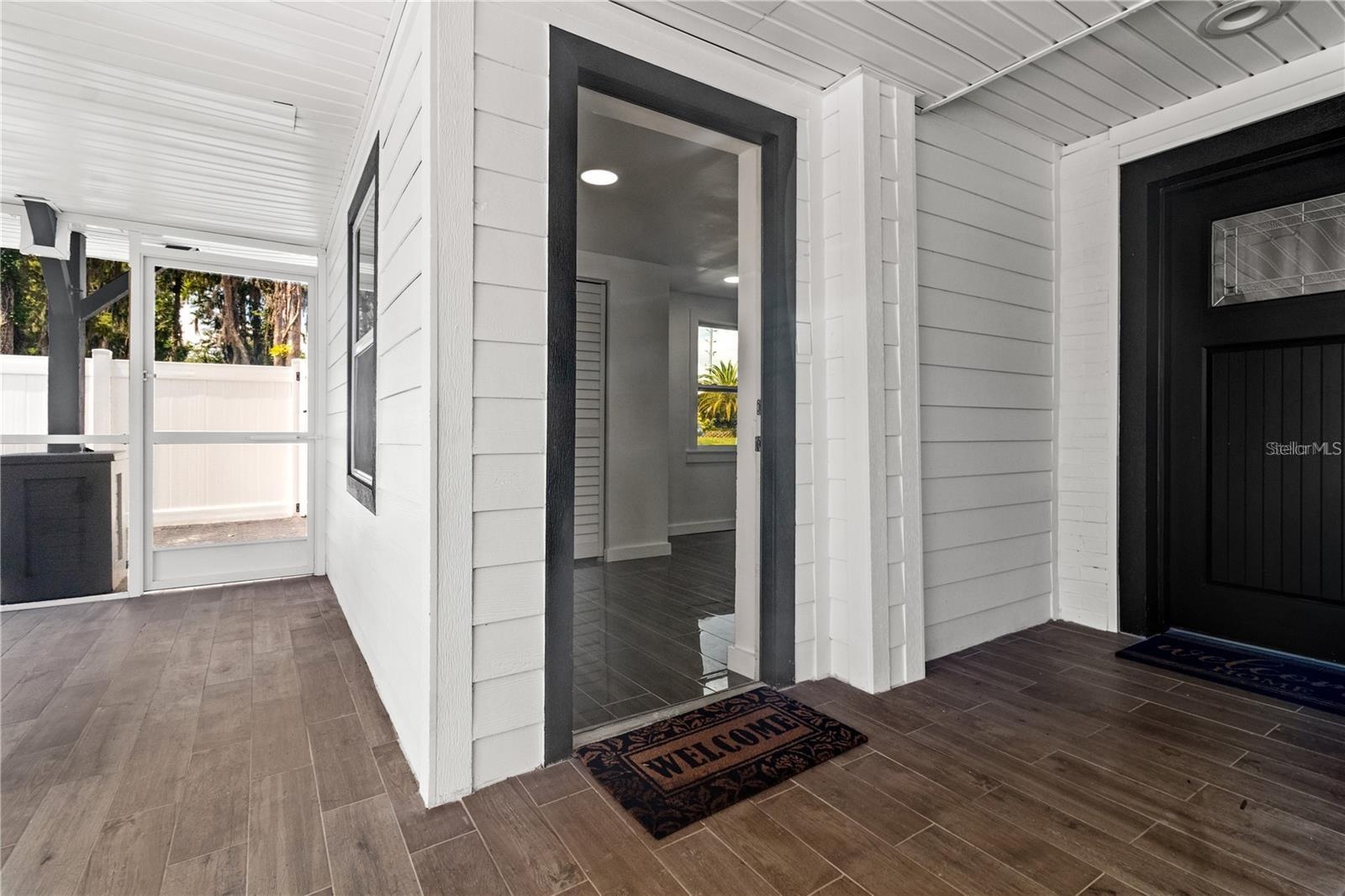 Private entrances to second primary bedroom and studio apartment