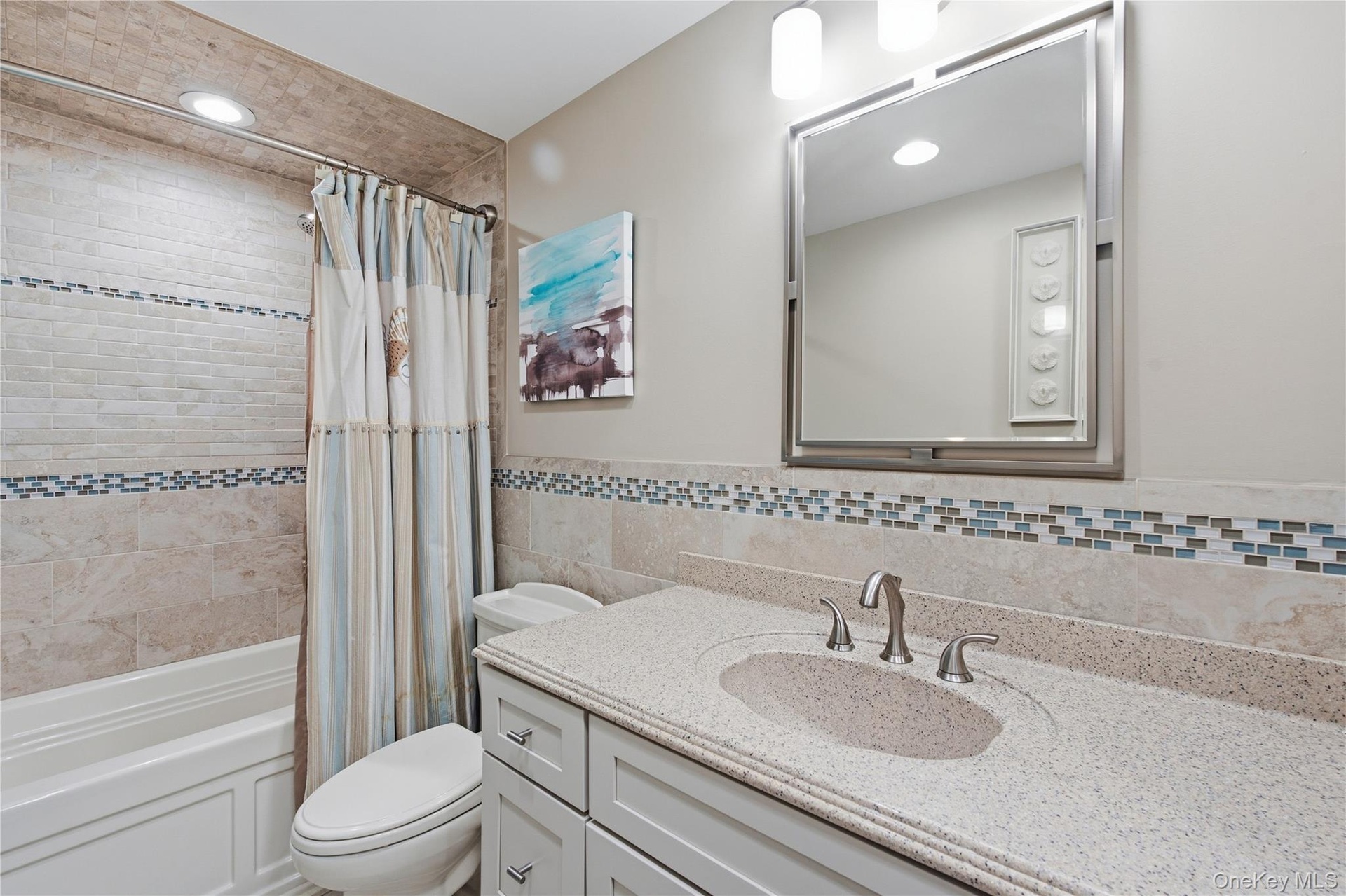 Updated bathroom with tub