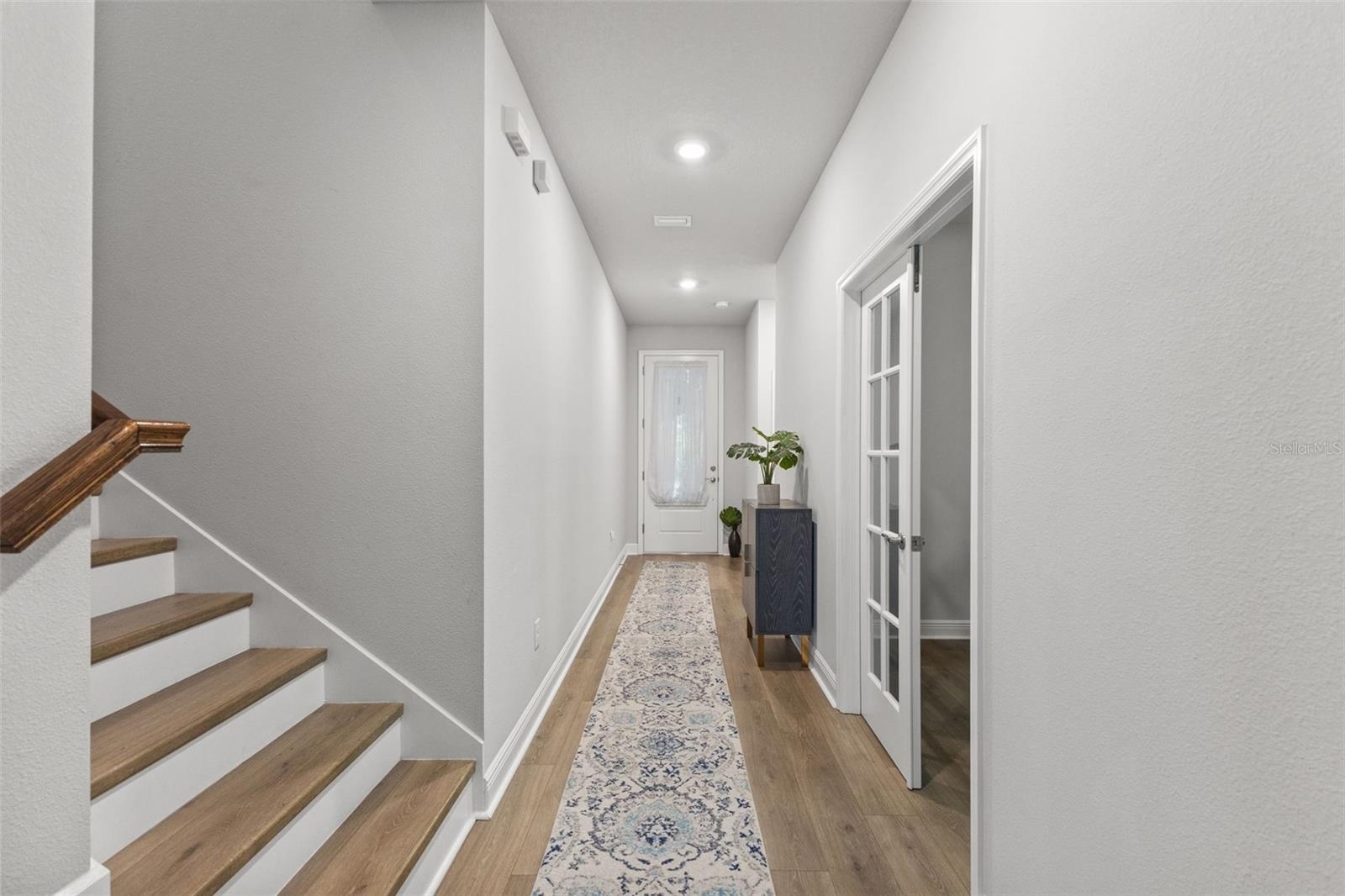 Stairs to 2nd floor, office to the right