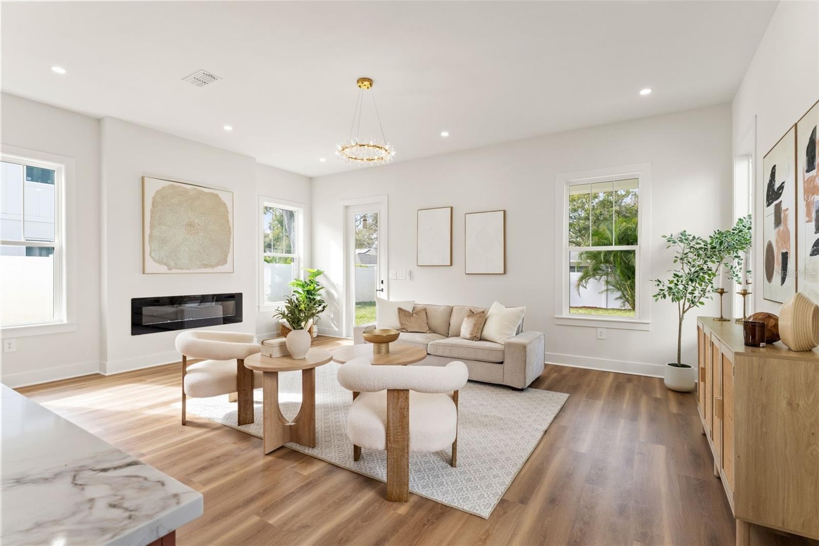 great room with quartz fireplace