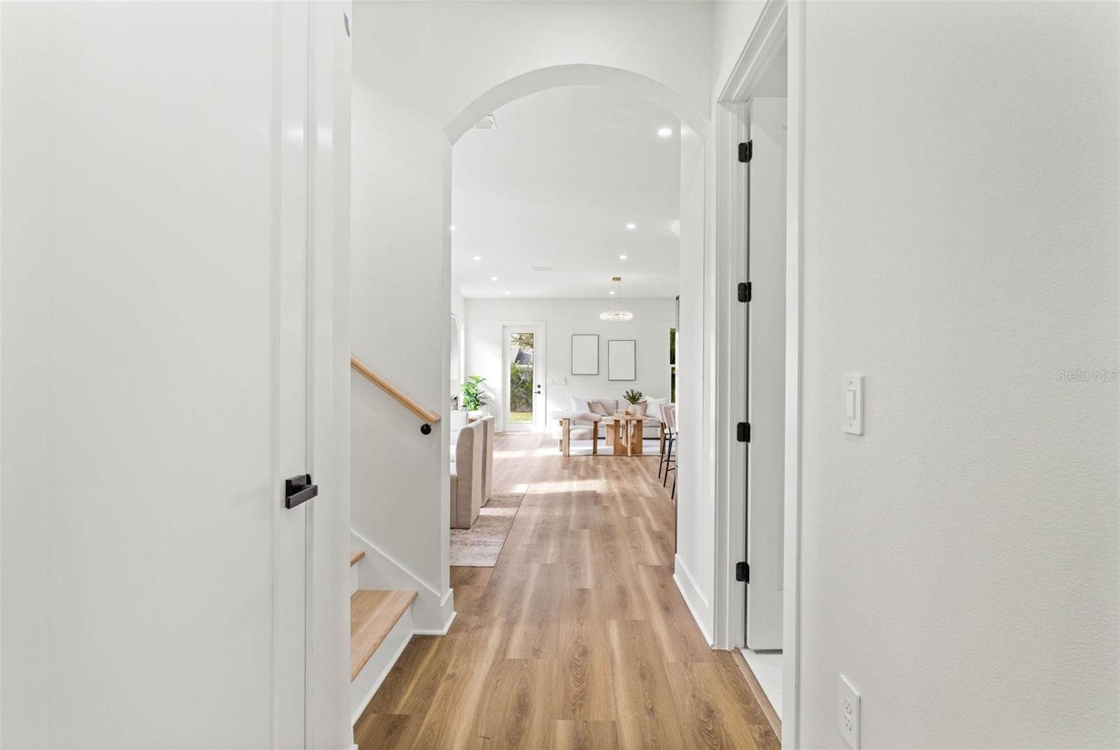 entry way hall to great room/ kitchen