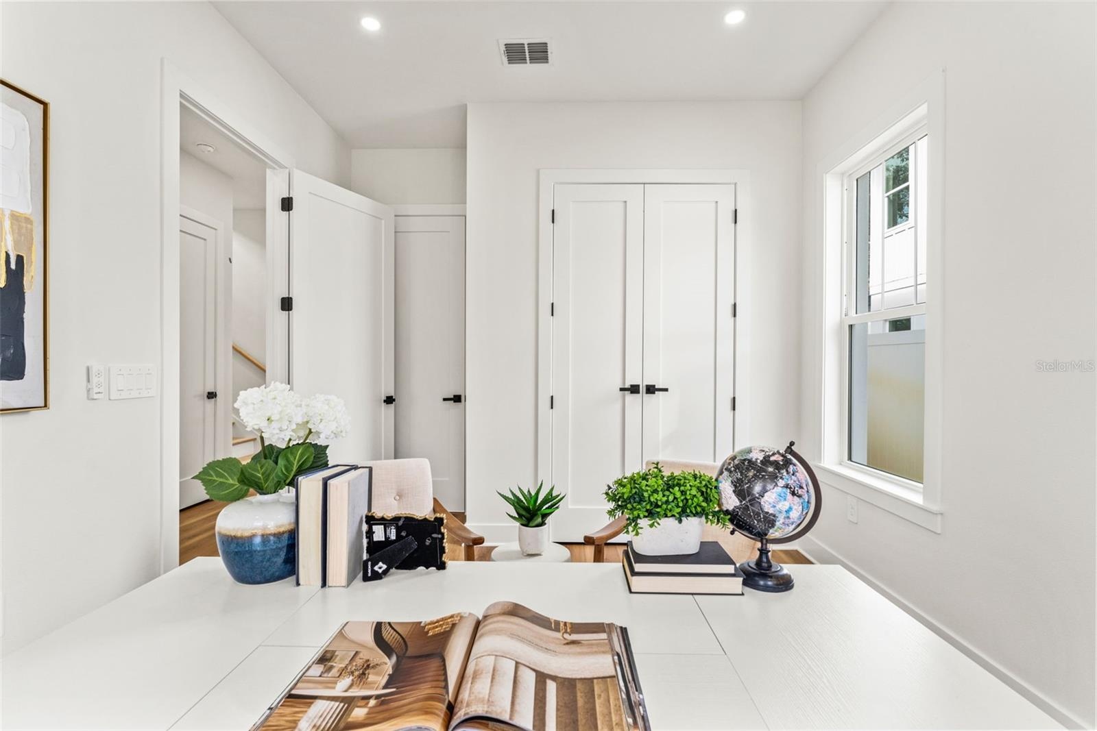 Downstairs bedroom shown as office
