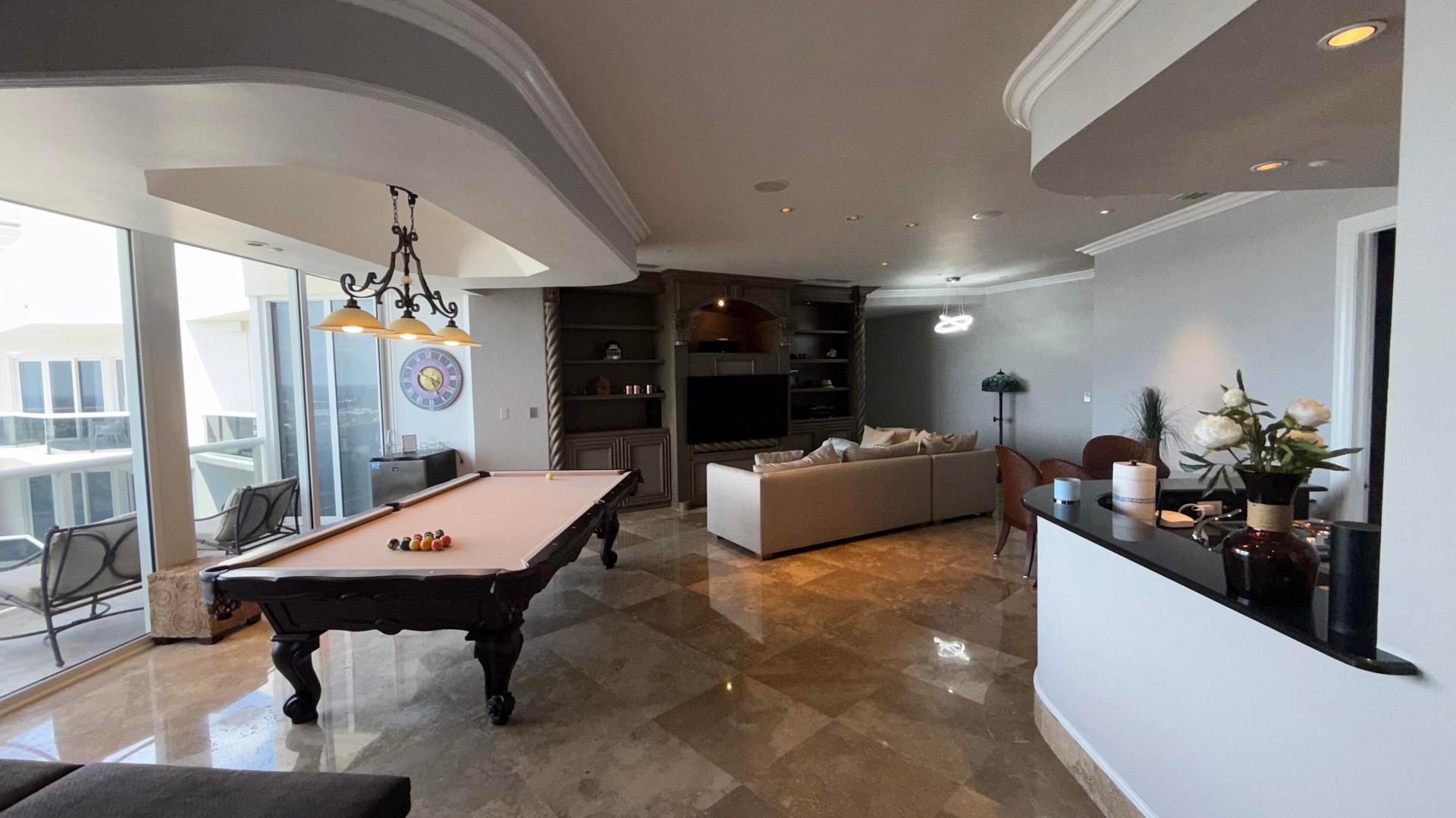 Game Room with entertainment center and second kitchen.