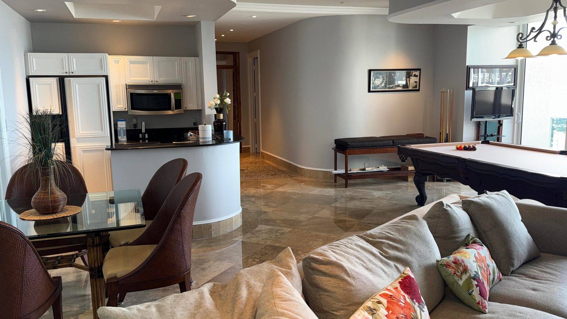 Game room with second kitchen.