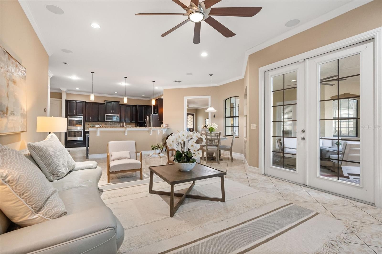 French doors leading to the patio and pool