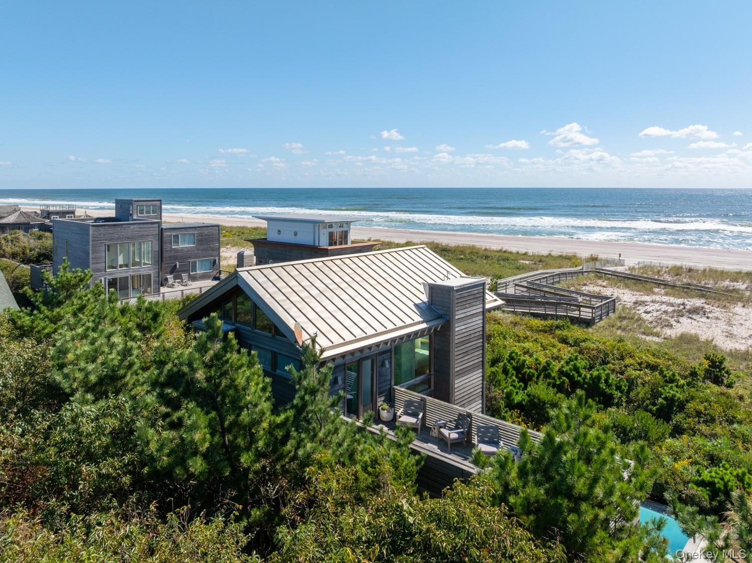 Aerial View From Behind Home with Atlantic Ocean in backdrop