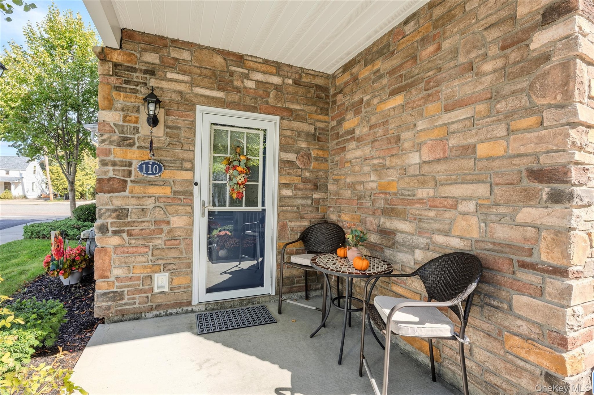 Stone veneer exterior entry