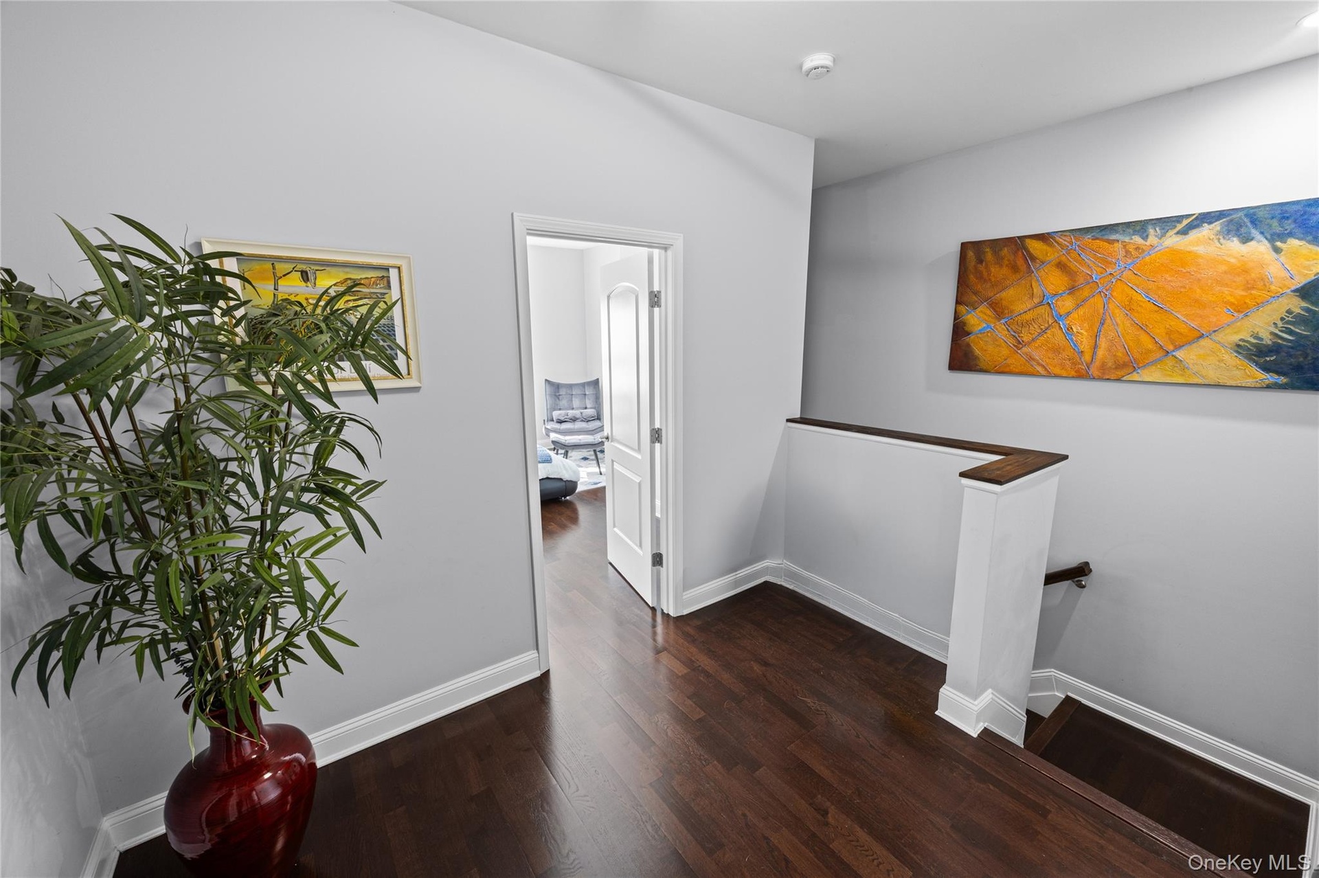 Hallway Entrance to Primary Suite -Wood Flooring