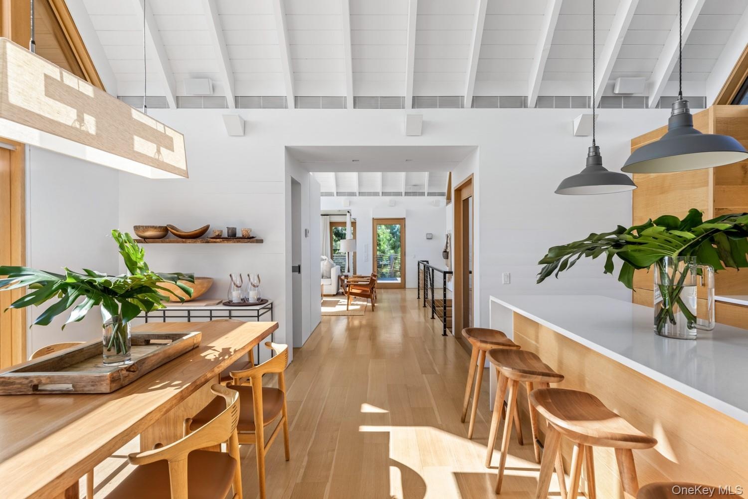 With 1x6 cedar tongue and groove ceilings with hardwood accents.