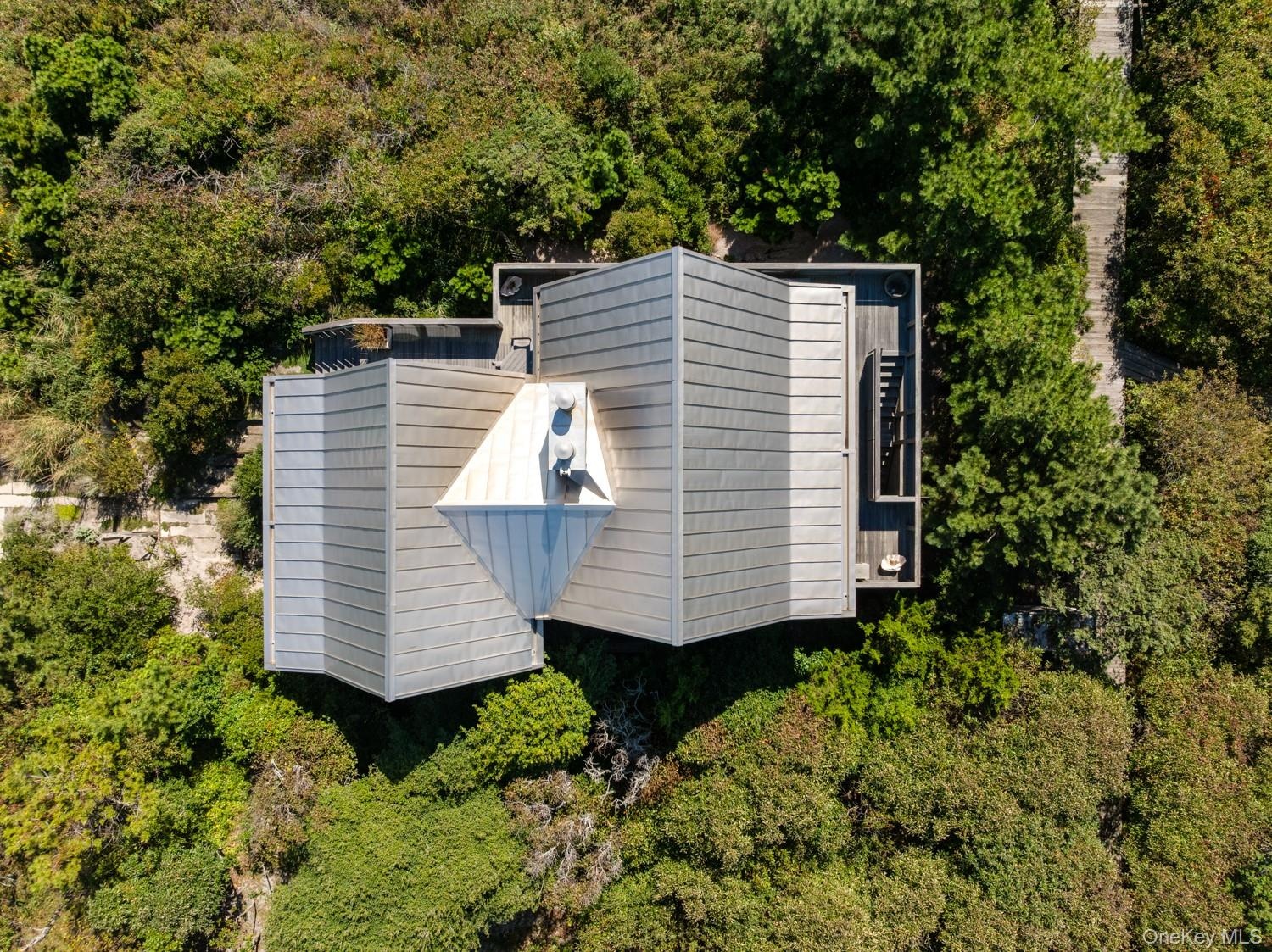 overhead view custom made  invarimate metal roof surrounded by National Seashore.