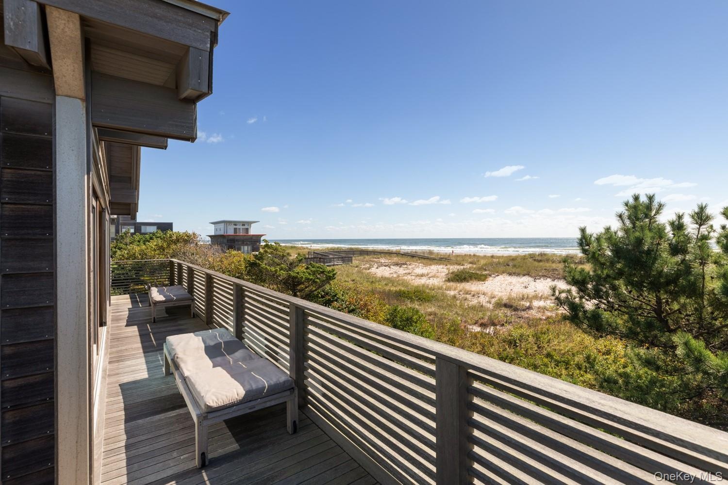 Upper deck made with 2 x 4 mahogony and custom made slats with view of the beach