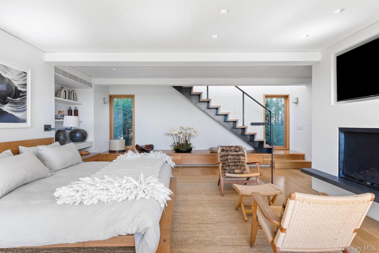 With custom built-ins and gas fireplace