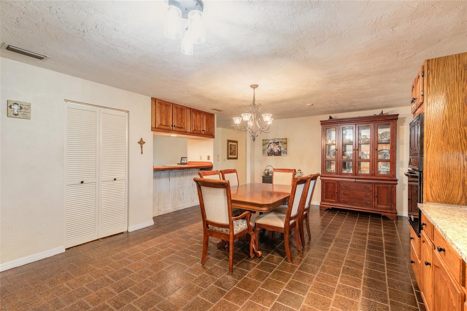 Kitchen with eat-in dining (fits table seating 8 comfortably)