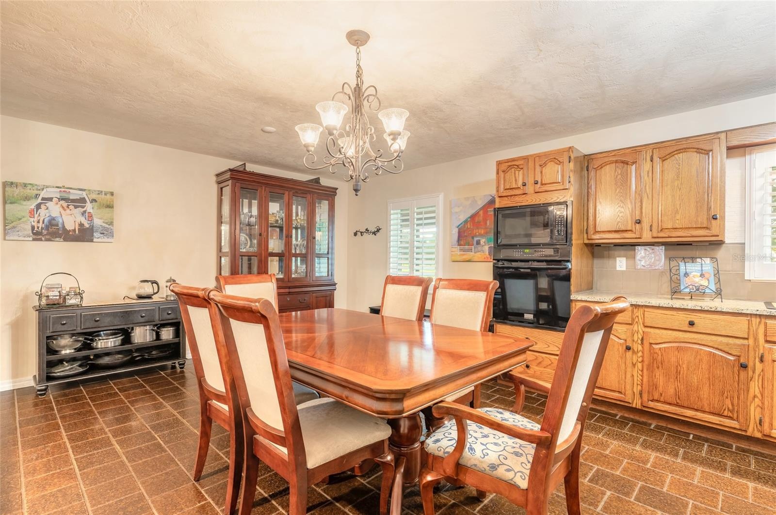 Kitchen with eat-in dining (fits table seating 8 comfortably)