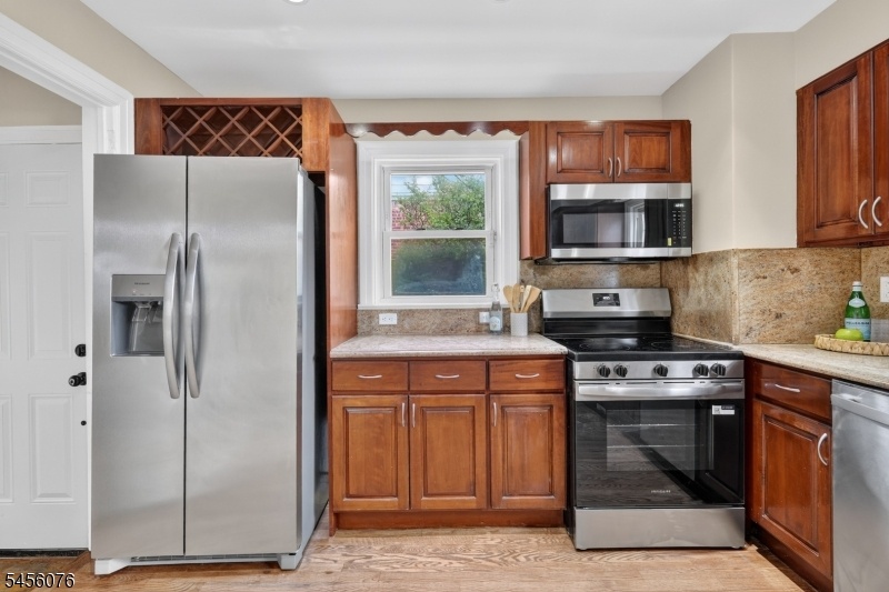 NEW STAINLESS STEEL APPLIANCES