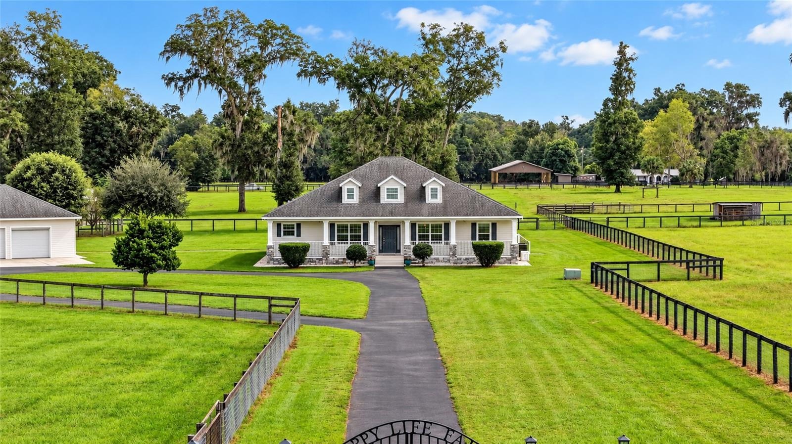 Custom-Built Farmhouse on 13.58 acres.