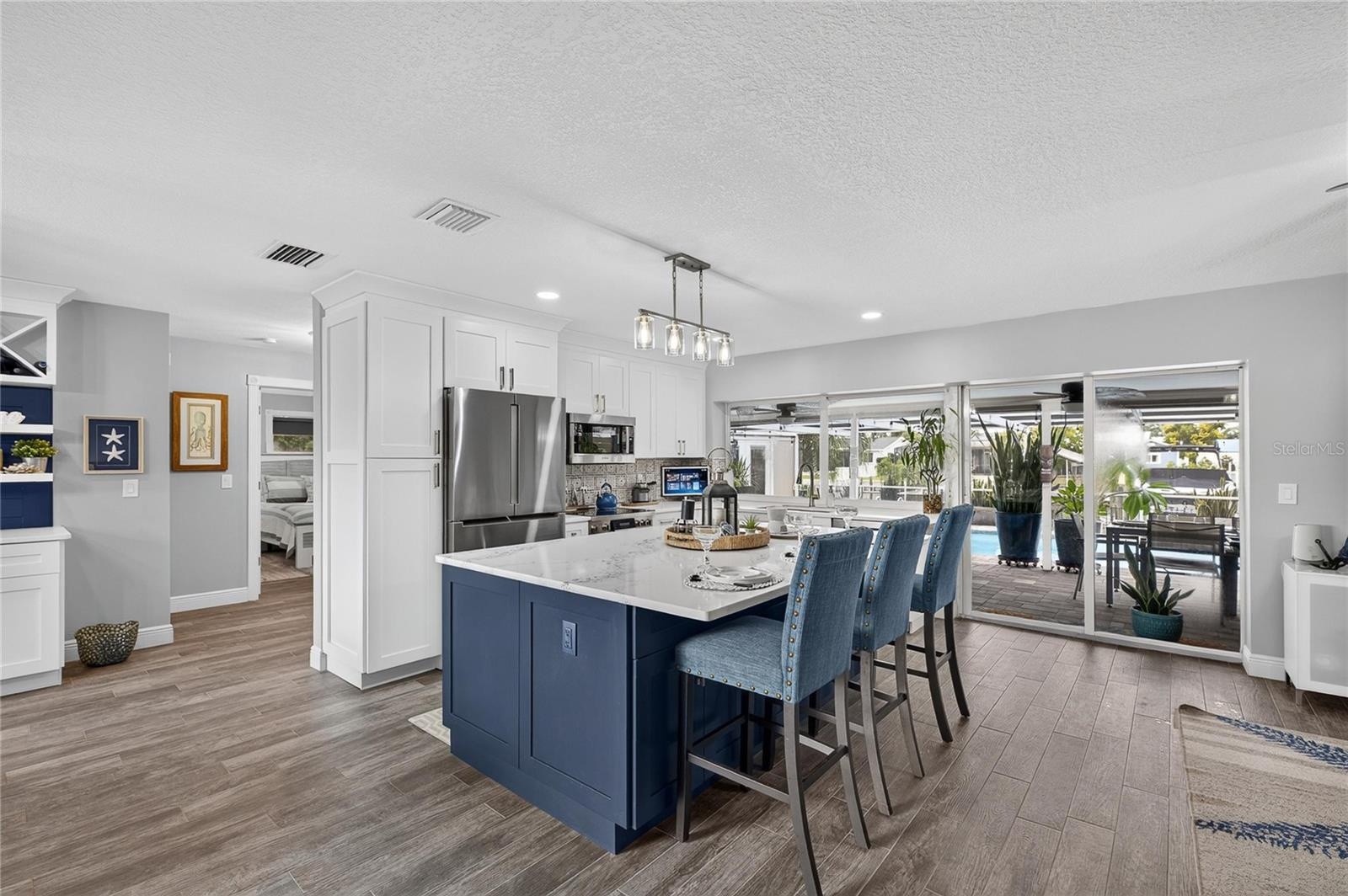 The Completely Remodeled Kitchen Anchors The Open Living Space!