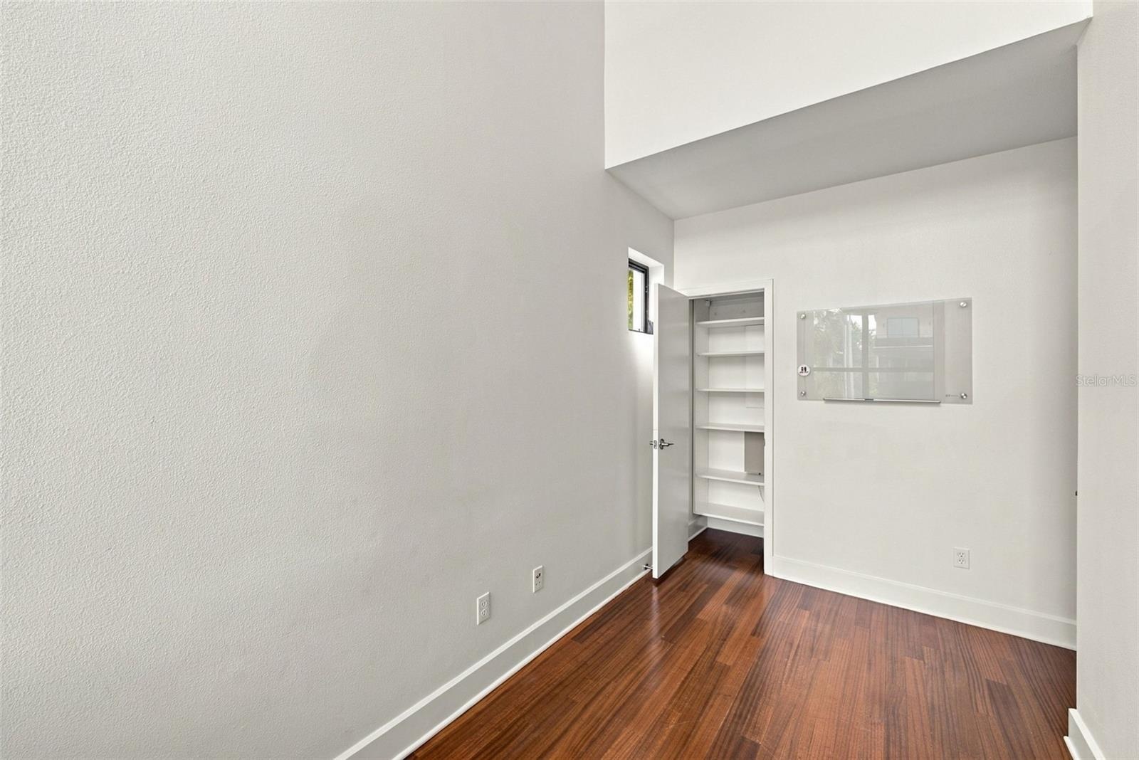 and a closet and door making it a possible 4th bedroom