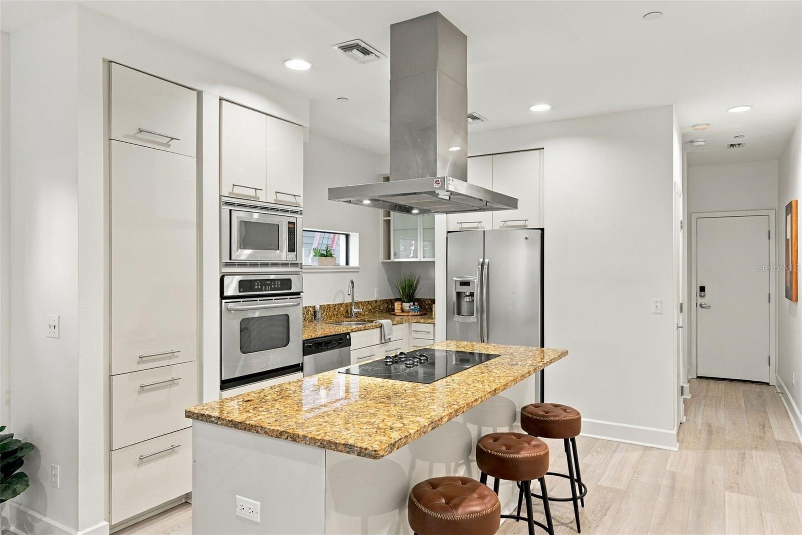 and opens to kitchen