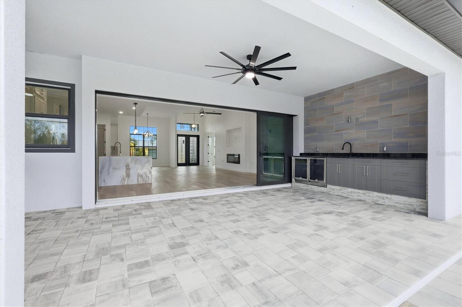 Hideaway slider doors make inside and outside entertaining easy