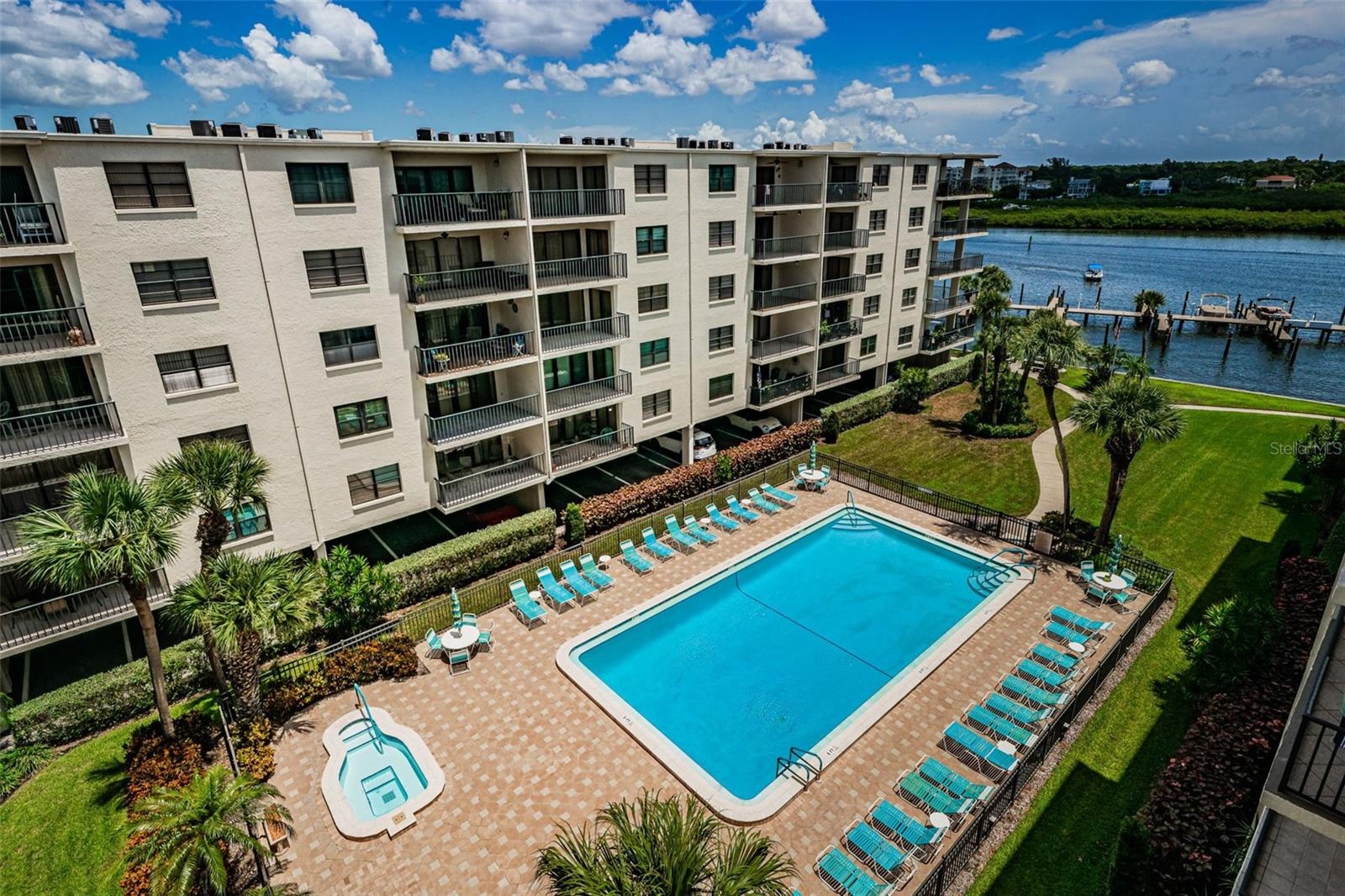 Aerial view of the Inground Pool and Spa, Directly on the Intracoastal with Newly Constructed Boat Slips!