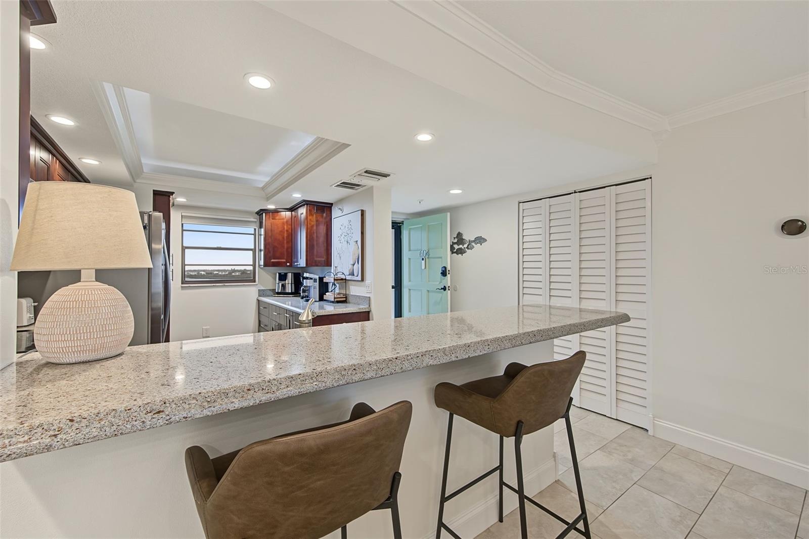 Breakfast Bar off the Kitchen and adjacent to the Dining area.