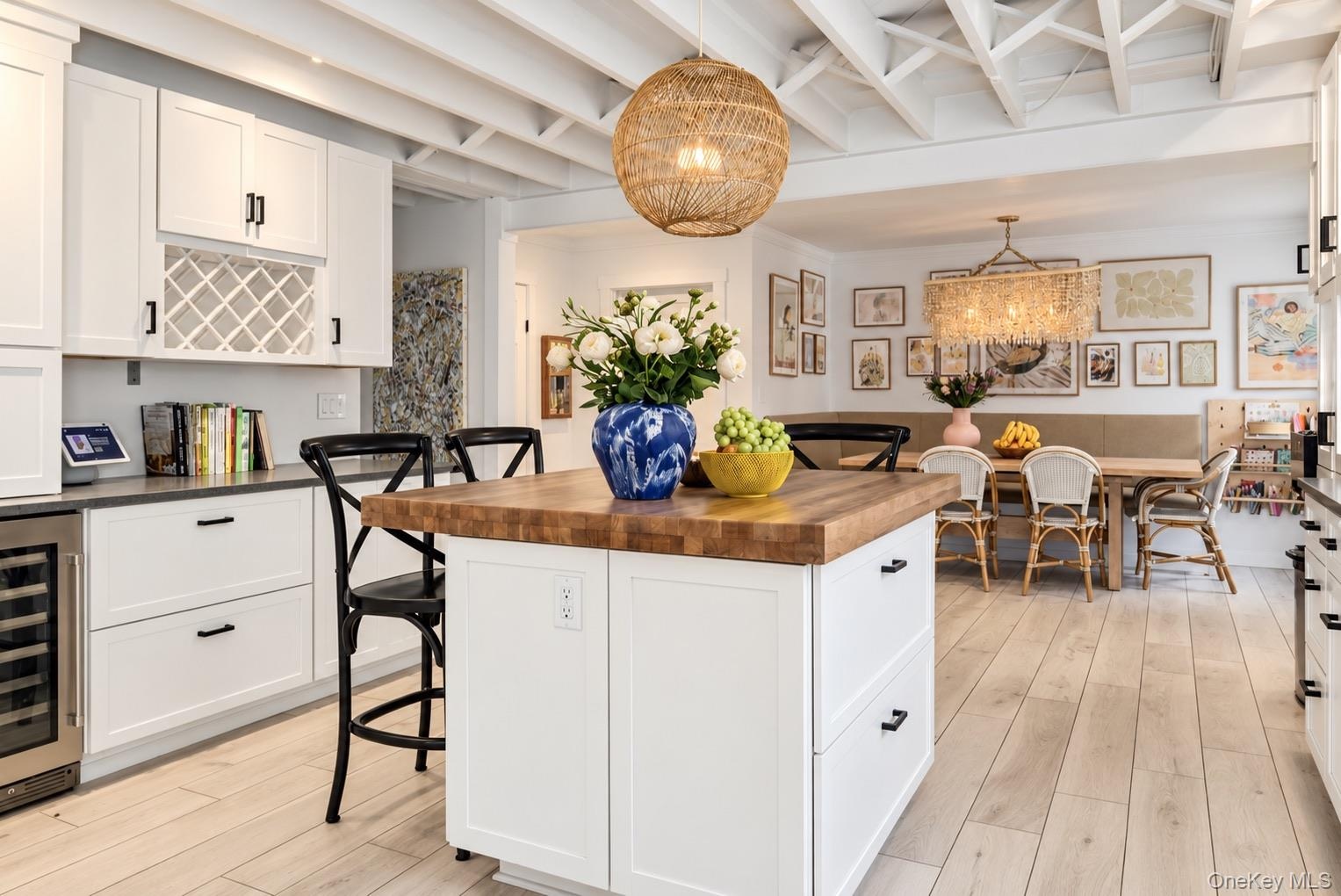 Renovated kitchen with island and custom cabinetry